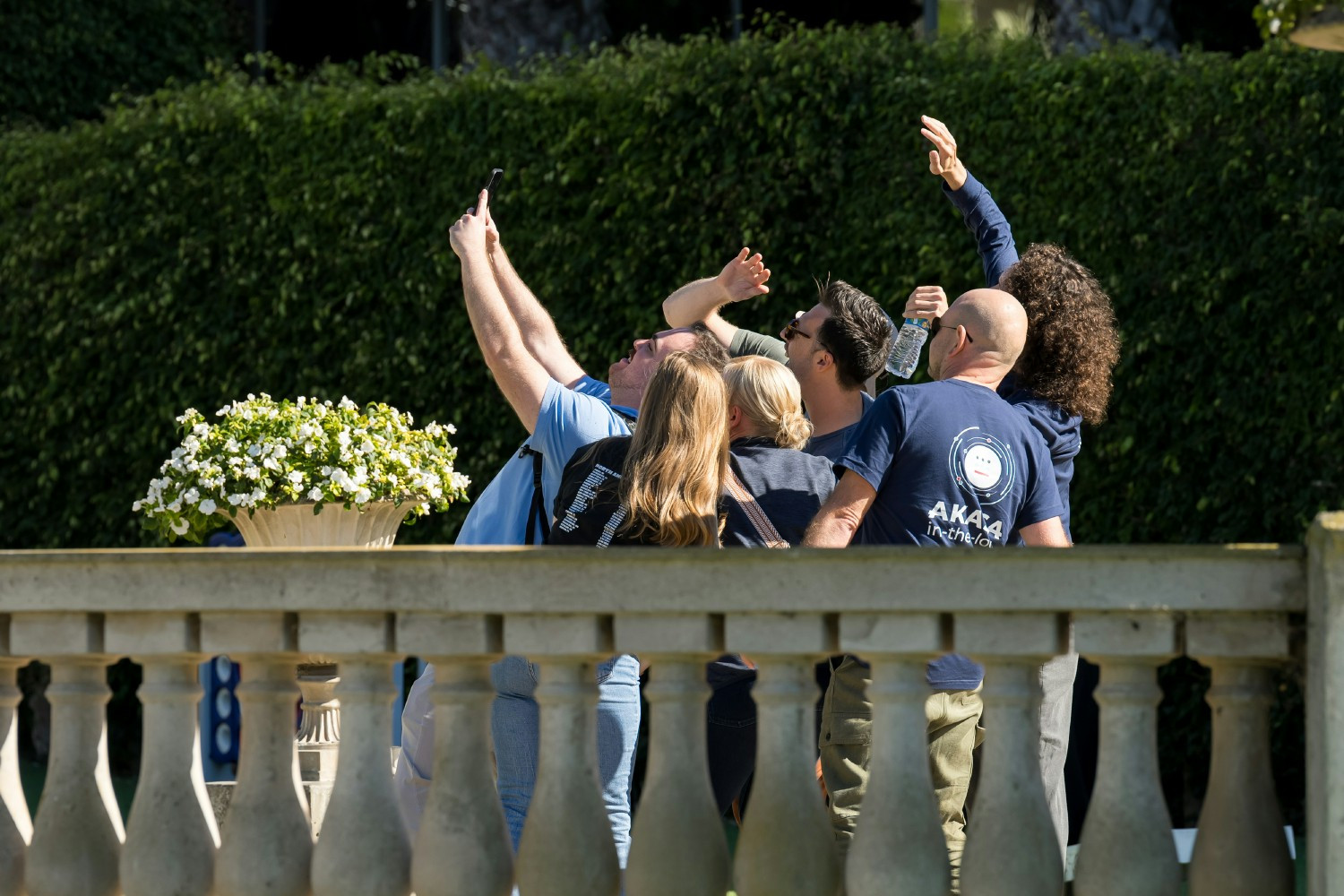 Taking a team selfie during a scavenger hunt.