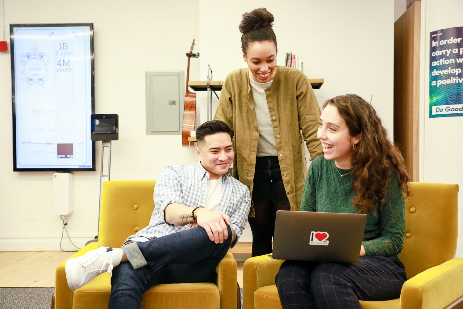 The monday.com team collaborating in the New York office.