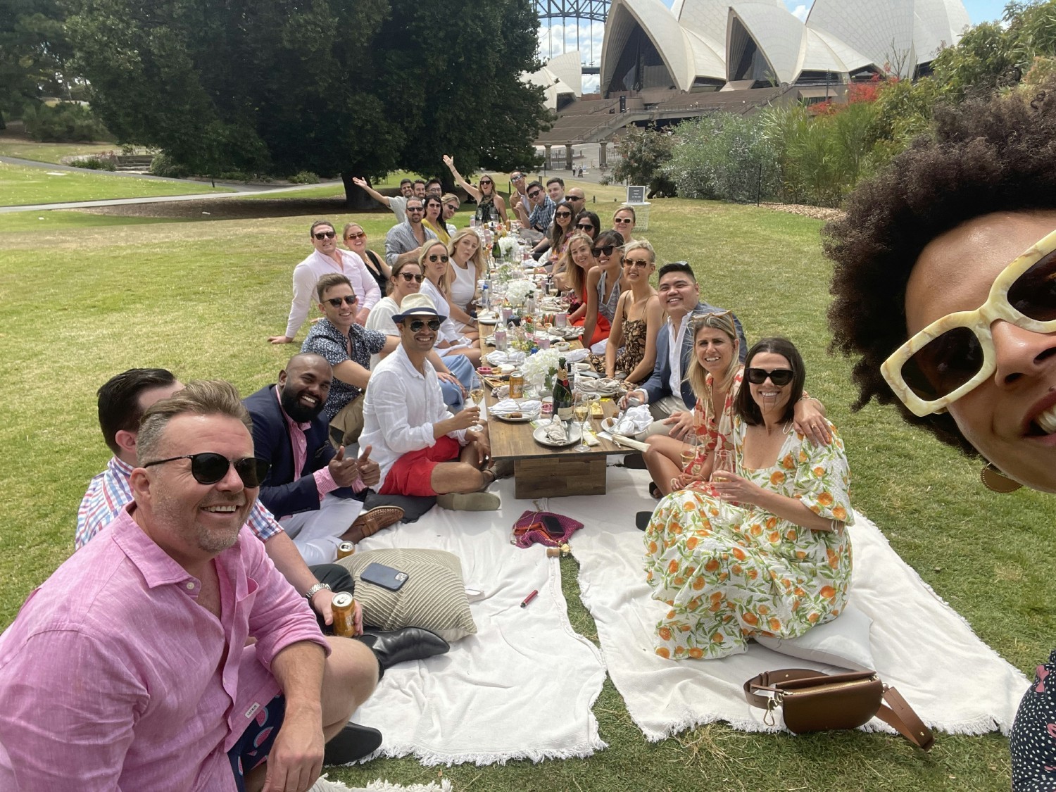 The monday.com team in Australia enjoying a picnic in the park.