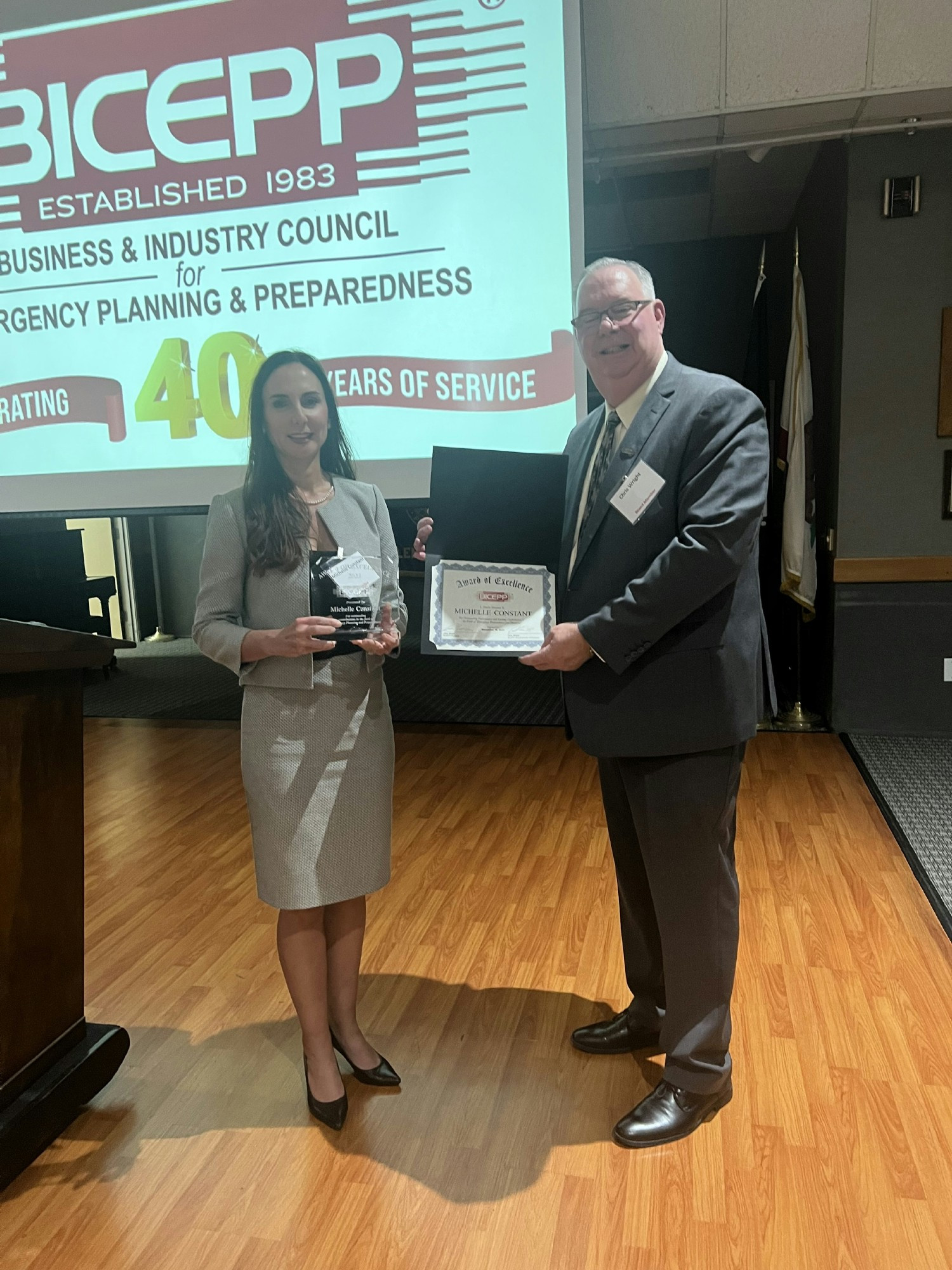 Michelle Constant, CEO, accepting an award from the Business & Industry Council for Emergency Planning & Preparedness (BICEPP)