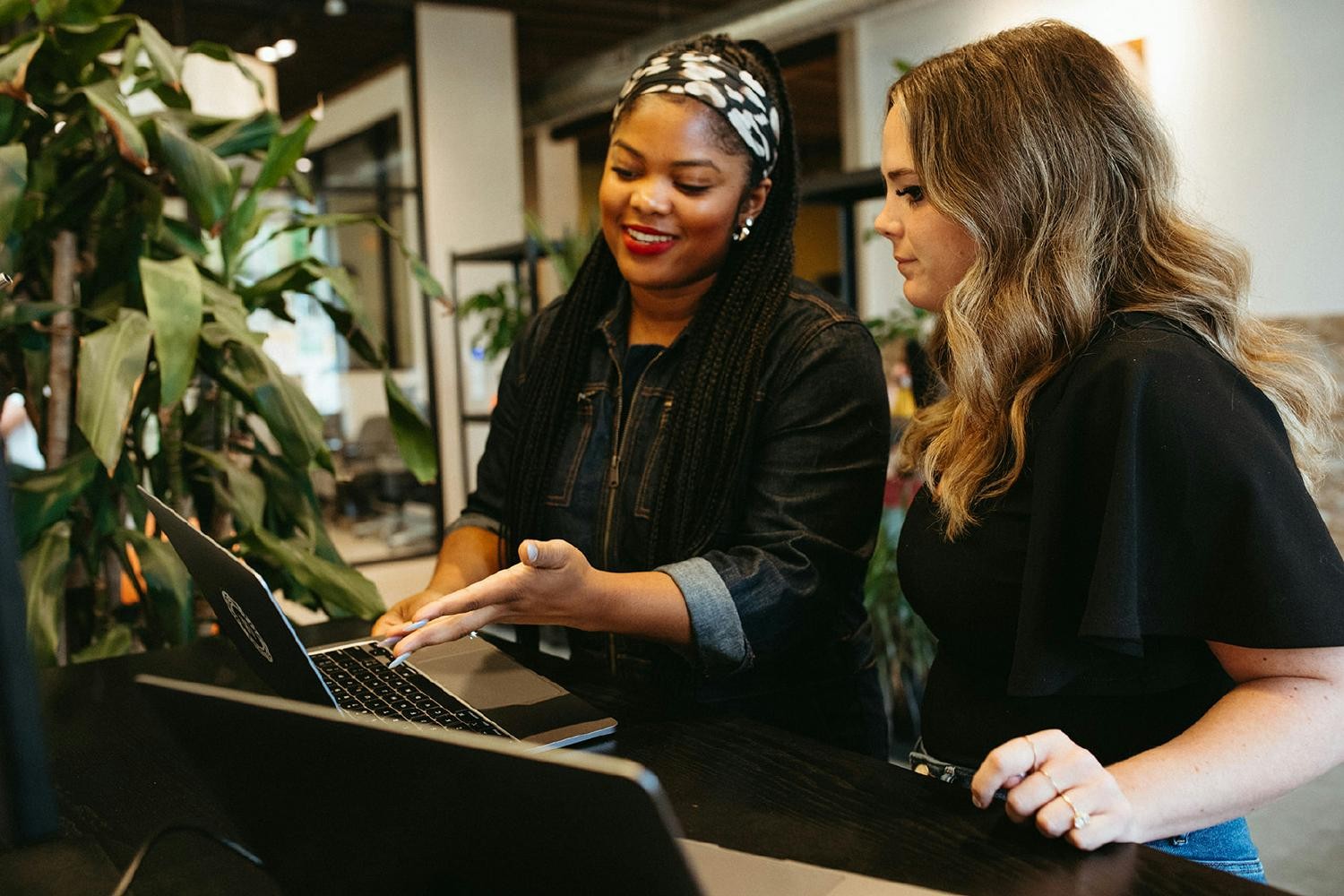 Chanel and Alison working at HQ