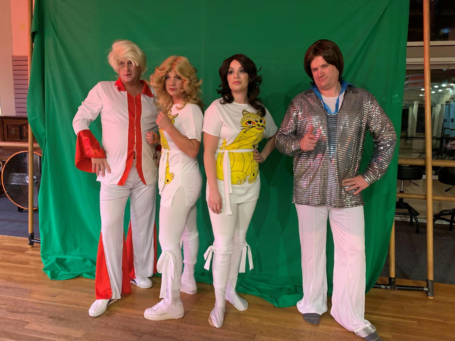 Each year we celebrate success in the form of a Holiday Party. This was our rendition of ABBA.