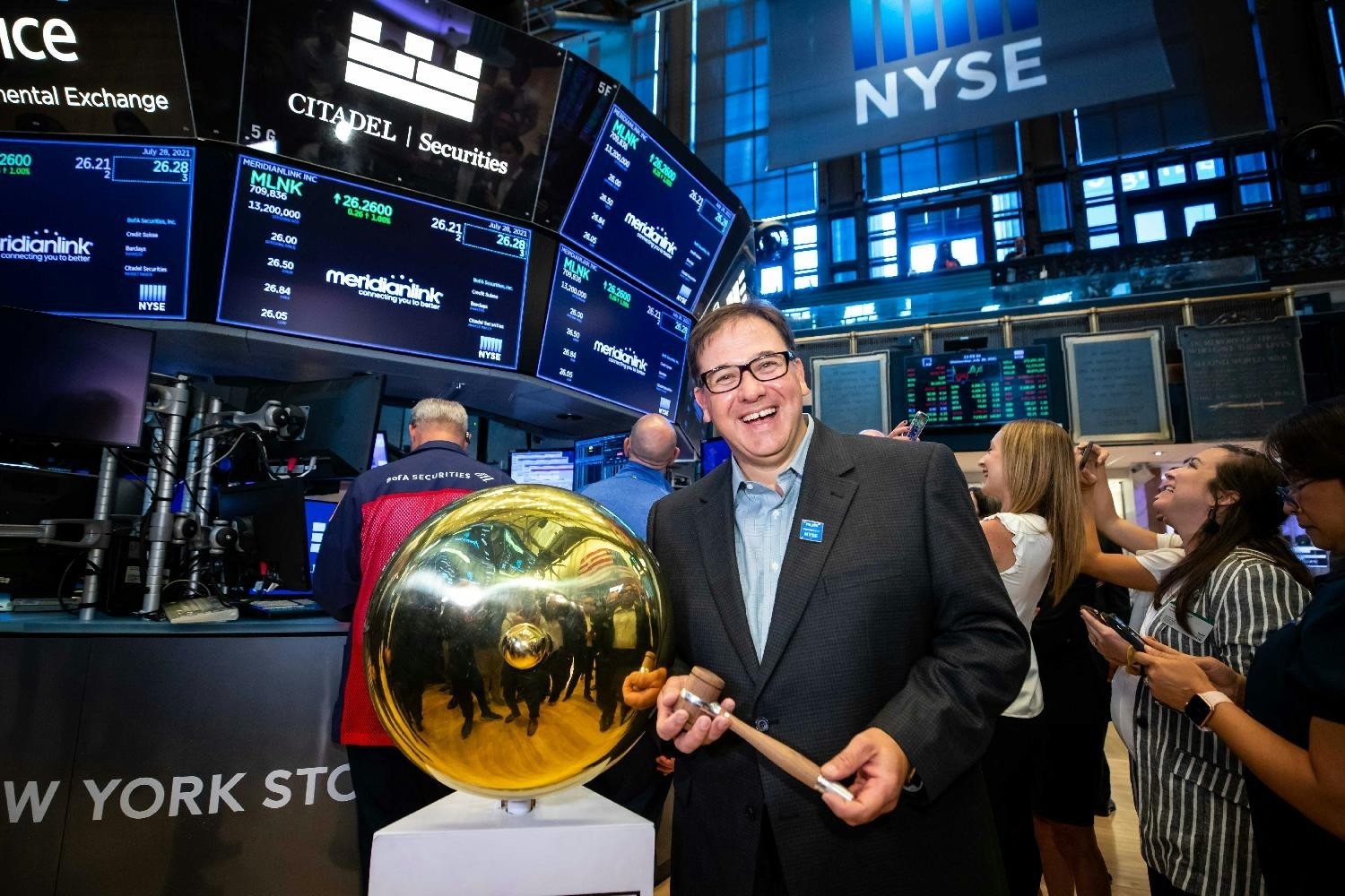 CEO Nicolaas Vlok rings the bell at the New York Stock Exchange to celebrate MeridianLink's IPO anniversary!