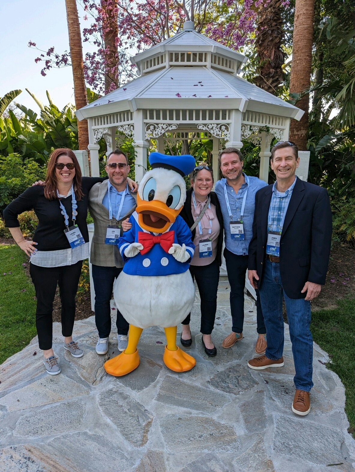 Marketing Team Members meet Donald Duck at MeridianLink User Forum at the Disneyland Hotel. 