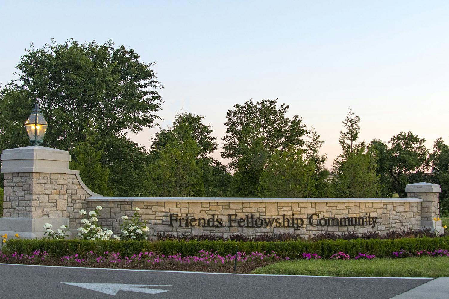 Employees, residents and visitors are greeted with an attractive stone wall at the entrance to the community.