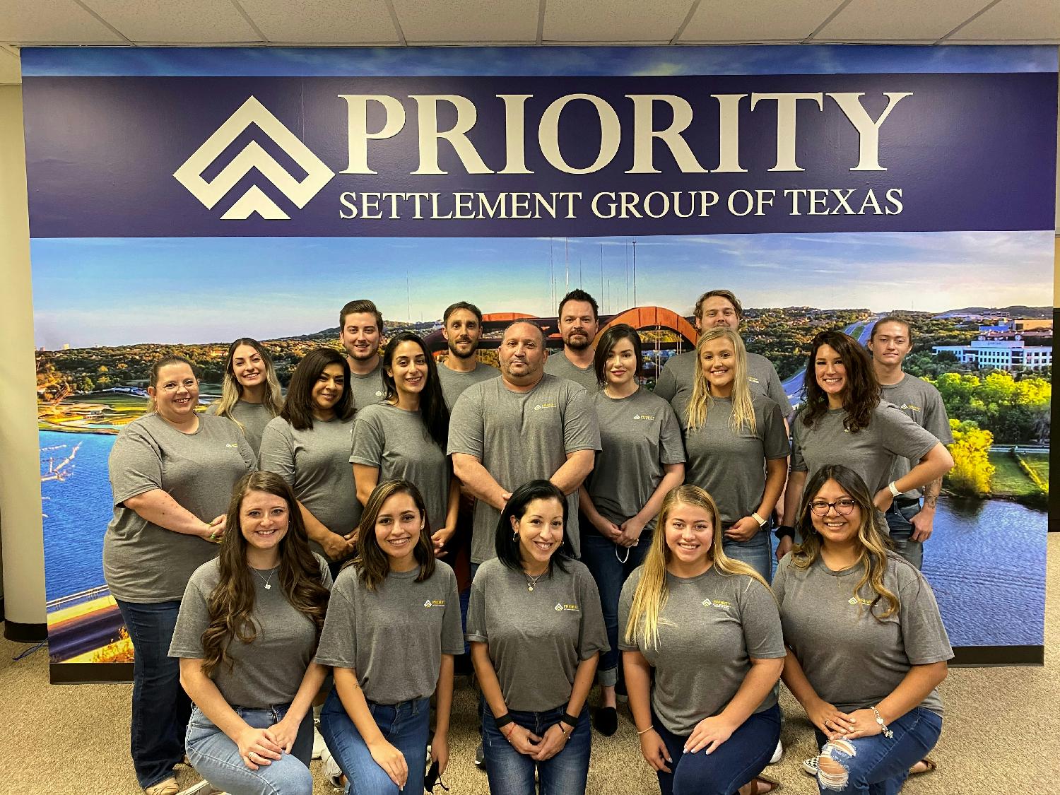 Our employees in Austin, TX taking time for a photo op during the move in to our newest office space.