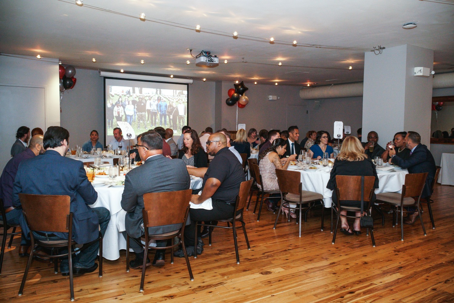 Employees gather to celebrate making Fortune Magazines Top 100 List for the second year.