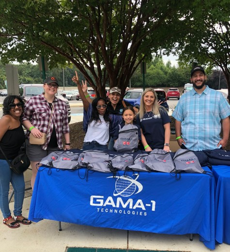 Cheering for our team! GAMA-1 staff having a blast at the baseball game!