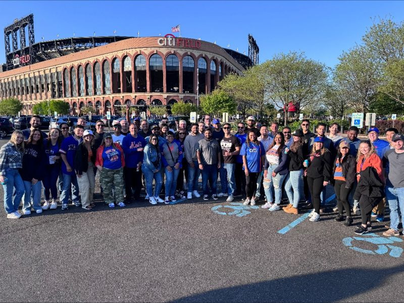 Our employees enjoying a baseball game