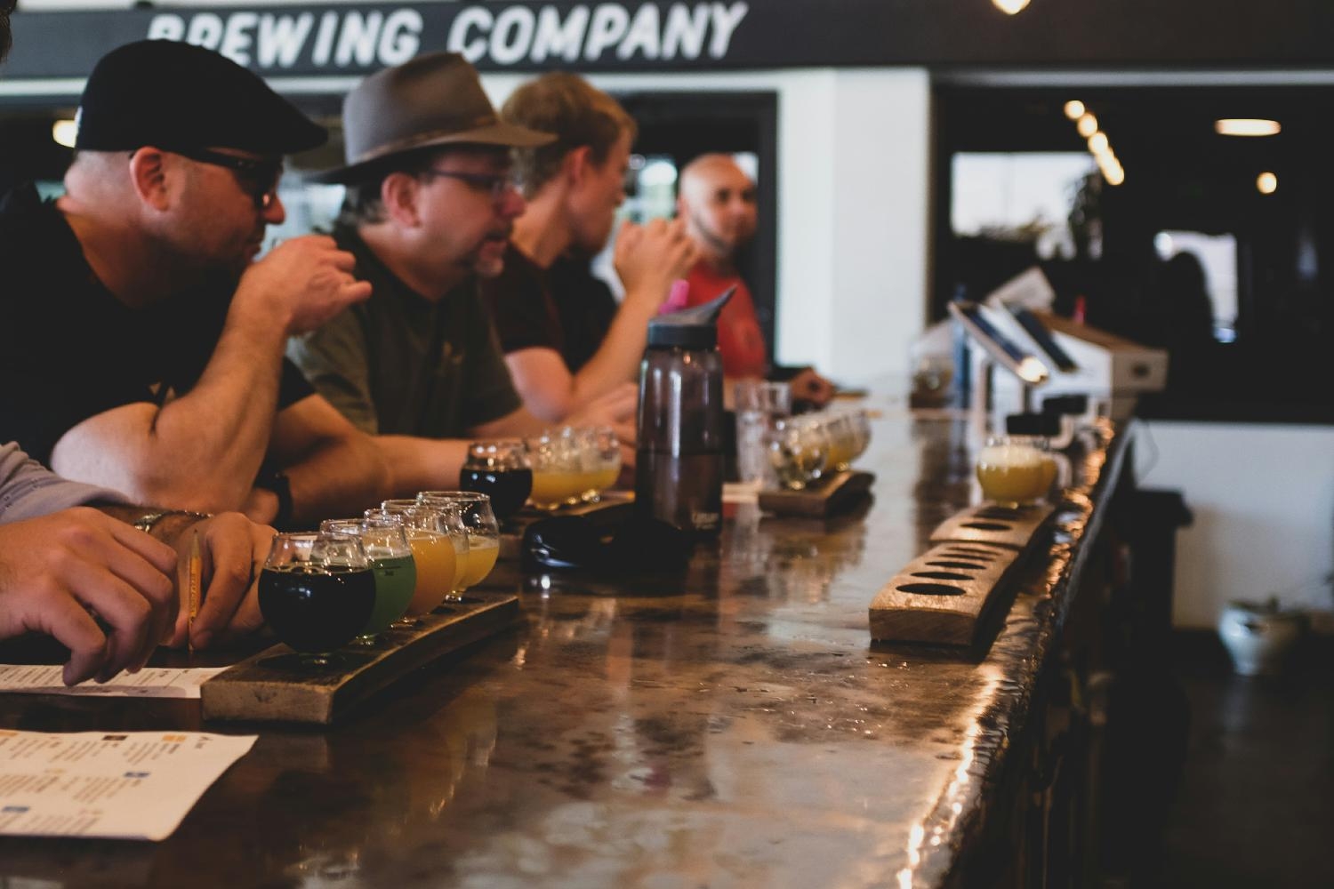 Guests enjoying flights at the WeldWerks bar.