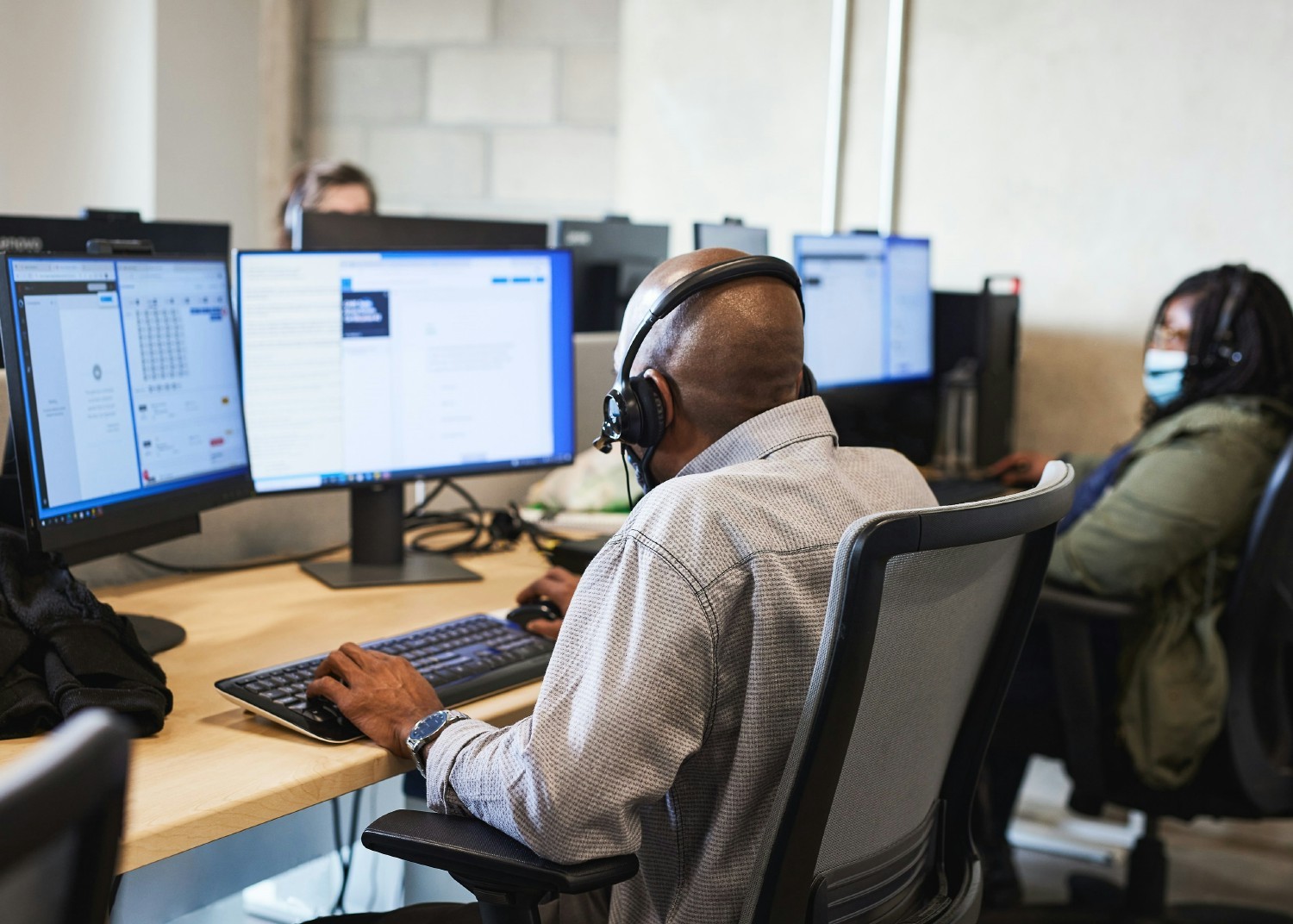 Team members at DispatchHealth's call center scheduling patient visits.