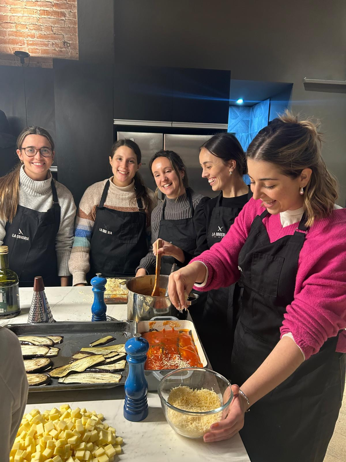 Uruguay colleagues celebrate at a women's event with a pasta making class. 