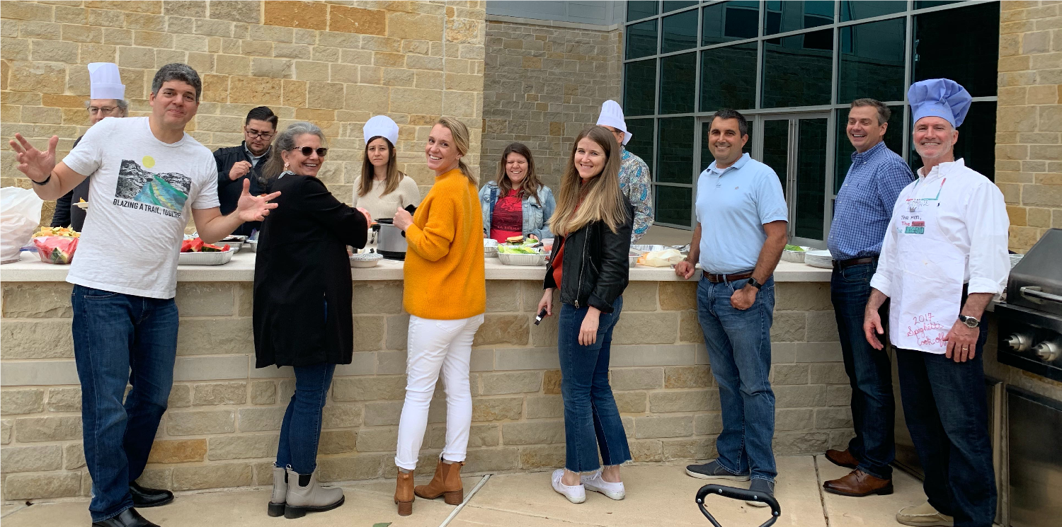 A classic pre-Pandemic BBQ outside the office.