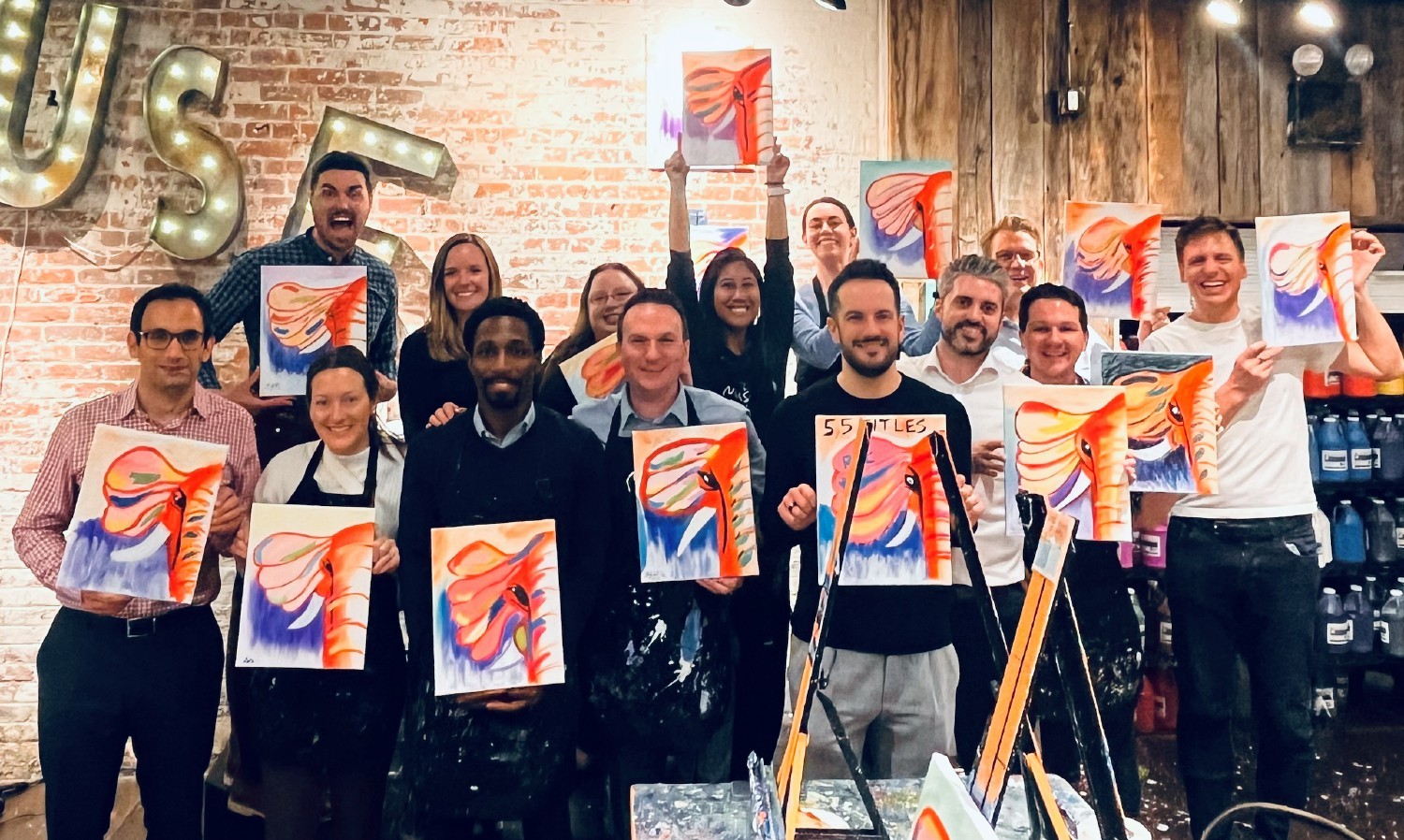 The Berkeley Partnership paints a rainbow of elephants at our monthly social! (Tribeca, NYC)