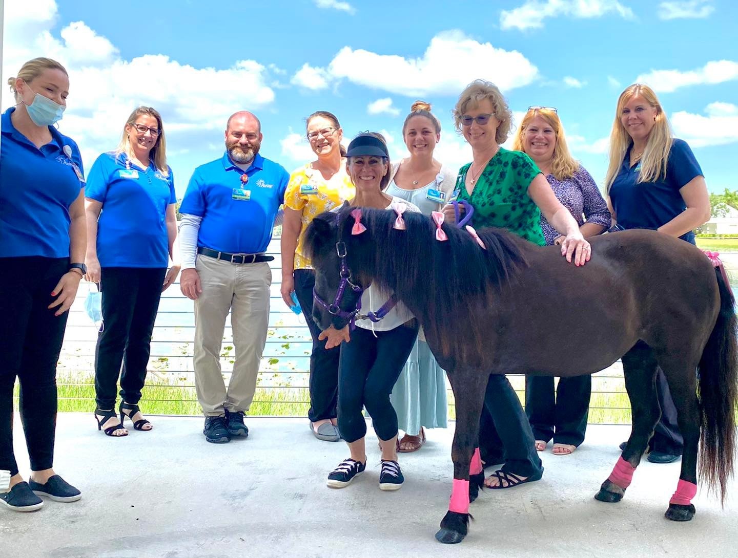 Everyone loves a pony! Employee enjoy a pony visit.