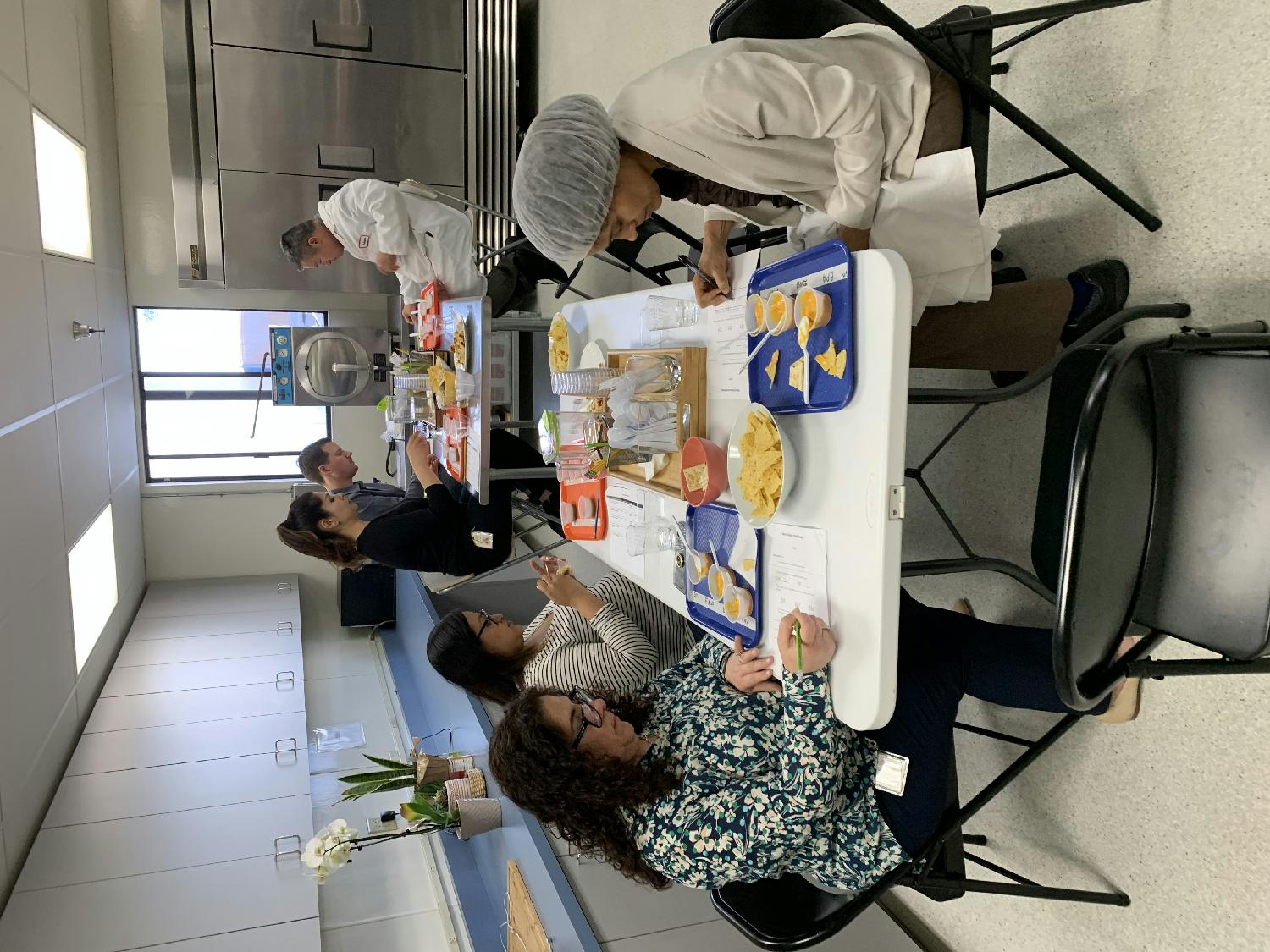 Juanita’s employees participate in a taste test. 