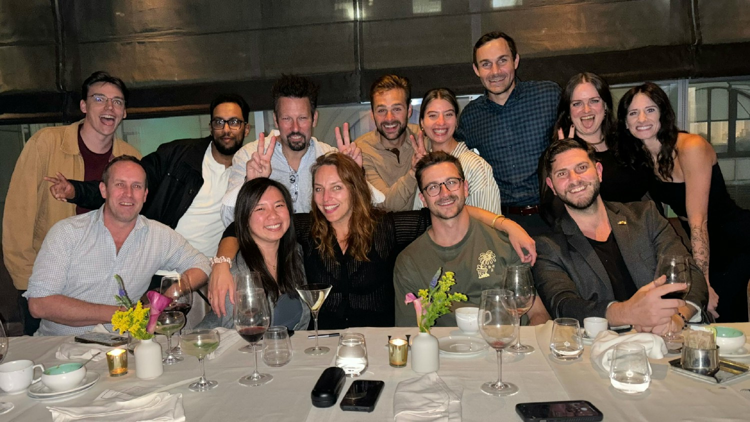 Welcoming our newest Roomies with open arms at a group dinner following a week long new hire orientation session.