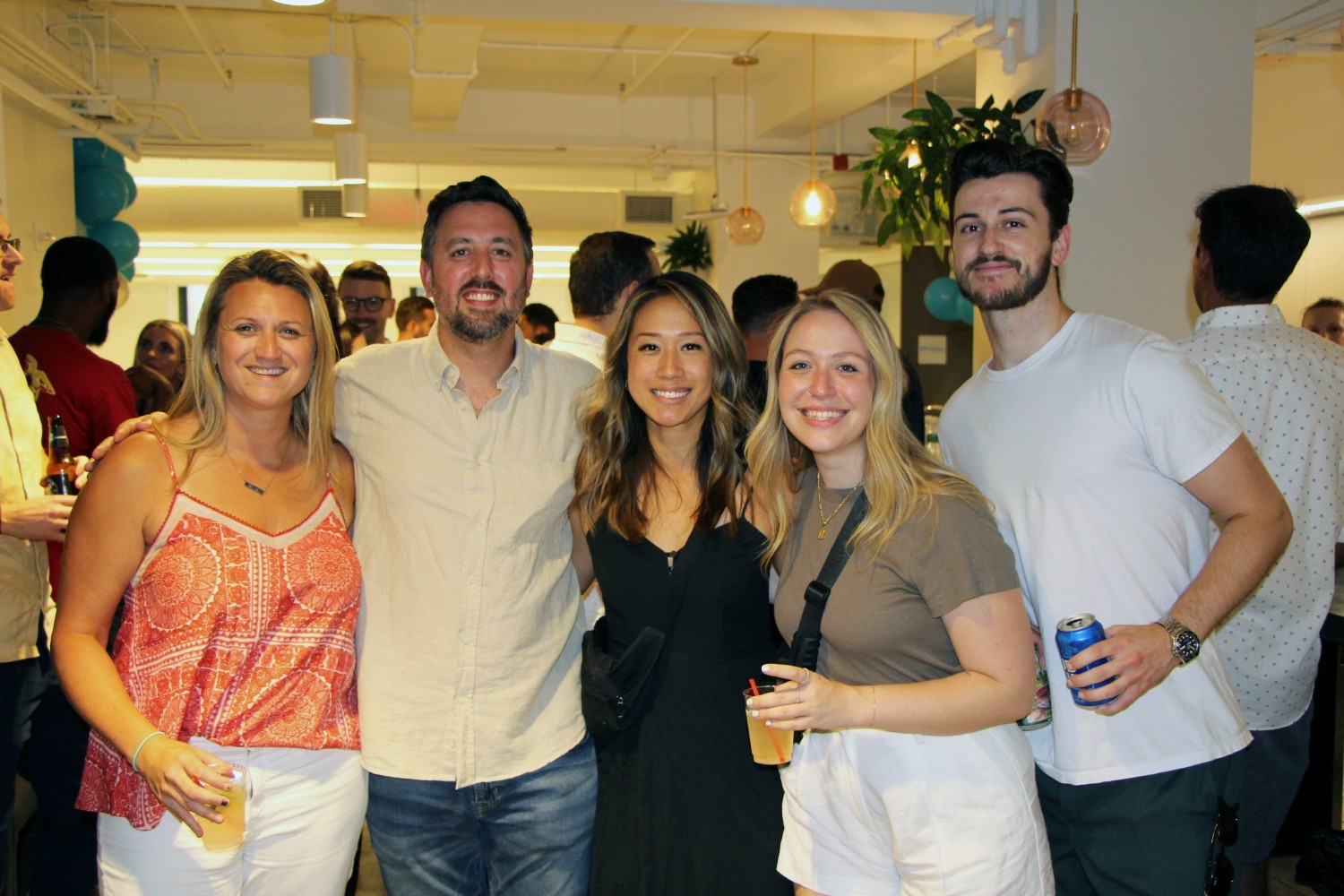 Roomies get together for a photo during our new office welcome party at our SevenRooms Headquarters in New York, NY.