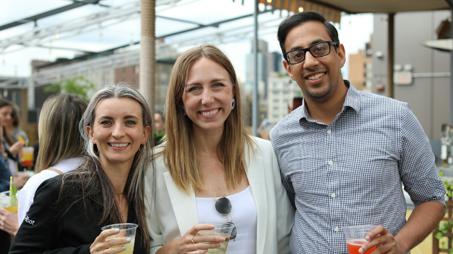 Product Roomies Jackie, Jordan, and Addy pose during our June Pre-Shift Pairing Happy Hour.