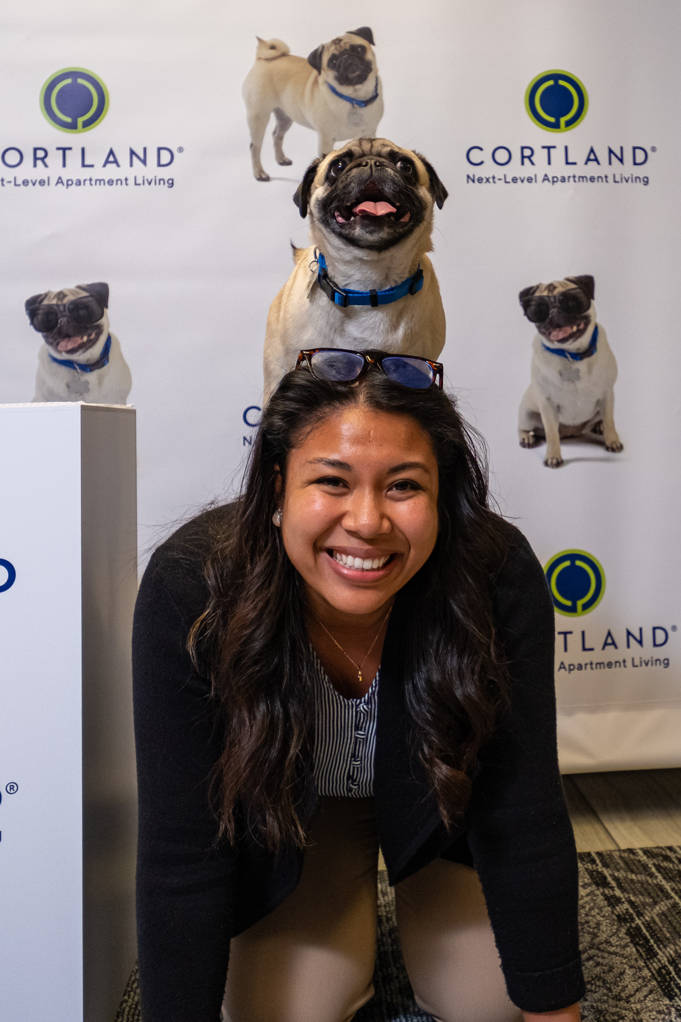 Cortland VP and Global Head of Sustainability, Cass McFadden, has a little fun with Cortie - our Cortland mascot.