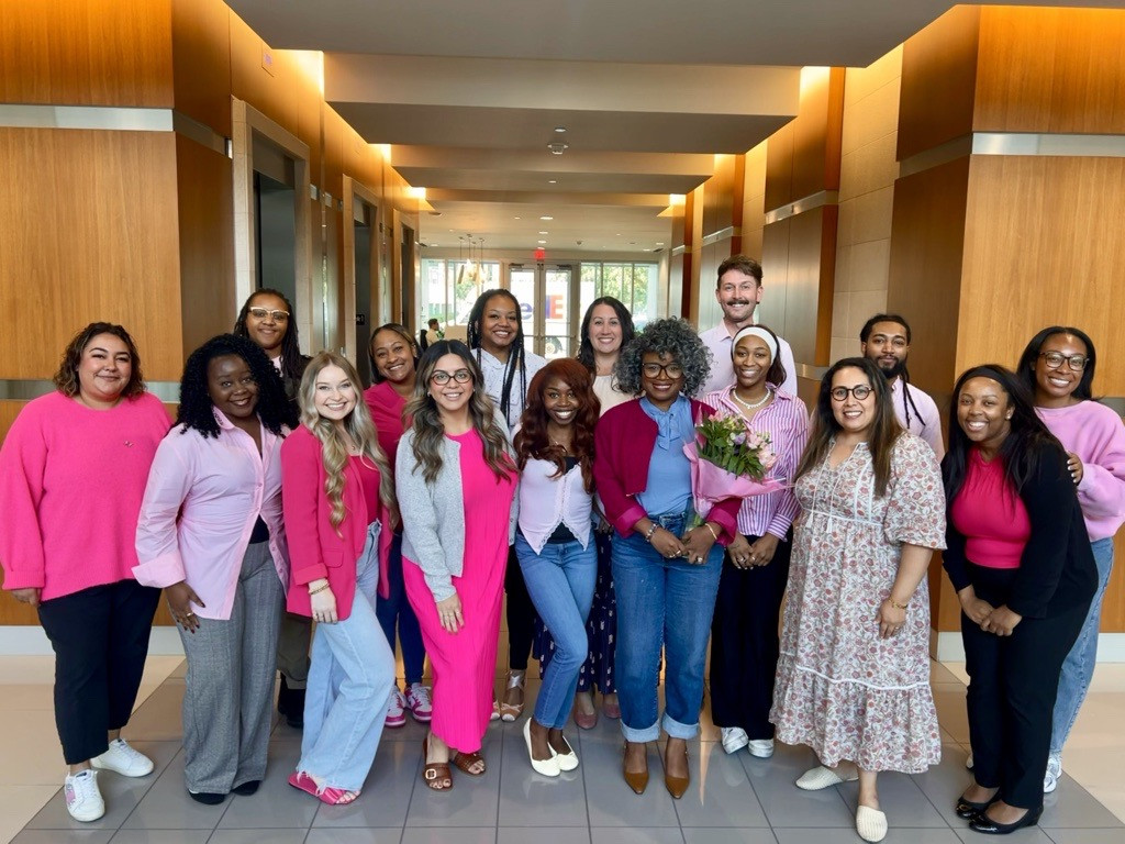 Wearing pink, spreading awareness, and supporting the fighters, survivors, and loved ones impacted by breast cancer.