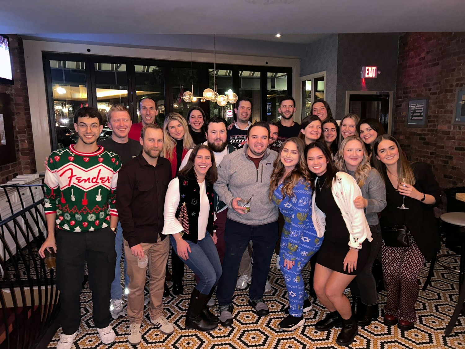 Invisors Boston teammates celebrating the holidays with a team gathering