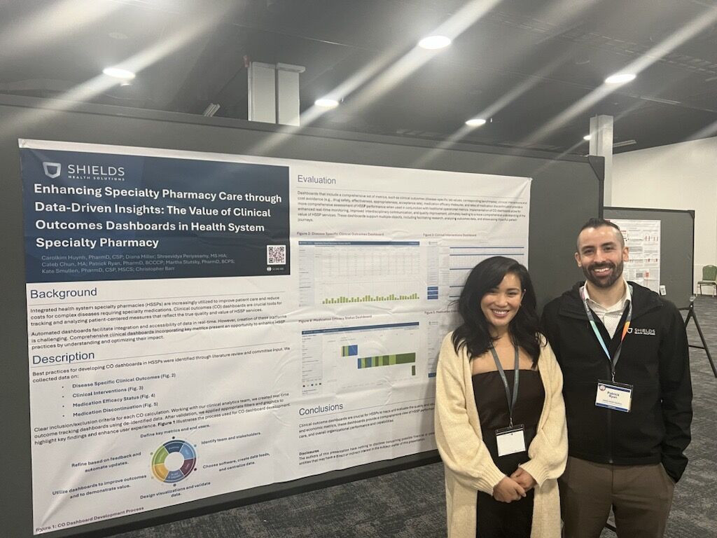 Shields team members presenting at a conference