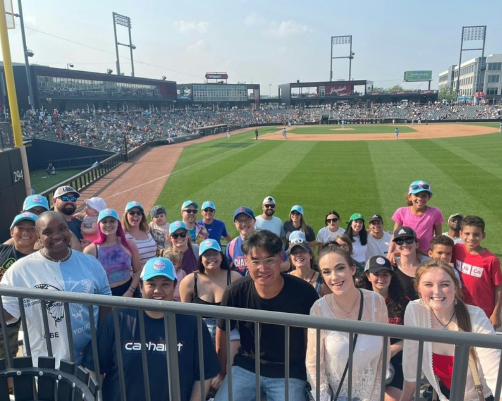 Our Lombard team hitting a home run at the Chicago Dogs game!