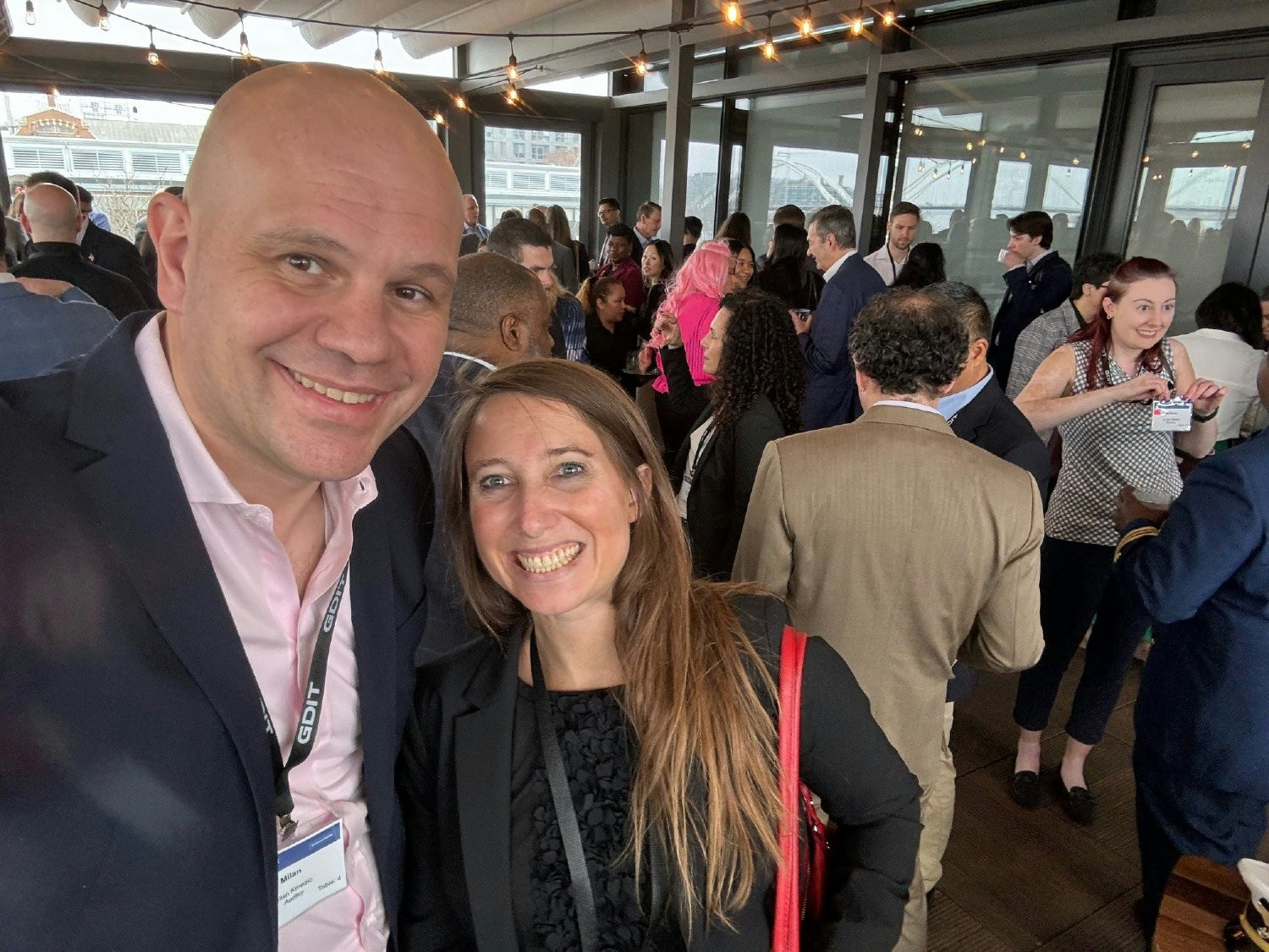 Audley Consulting Group's CTO, Milan Kmezic and Director of Corporate Development, Colleen Law at an event 