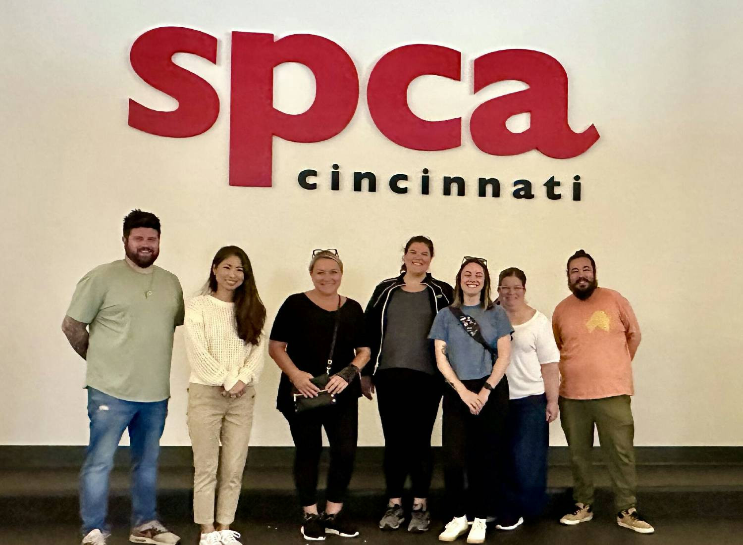 A group of SentriLock employees volunteering at a local non-profit called SPCA Cincinnati, preparing nutritious meals fo
