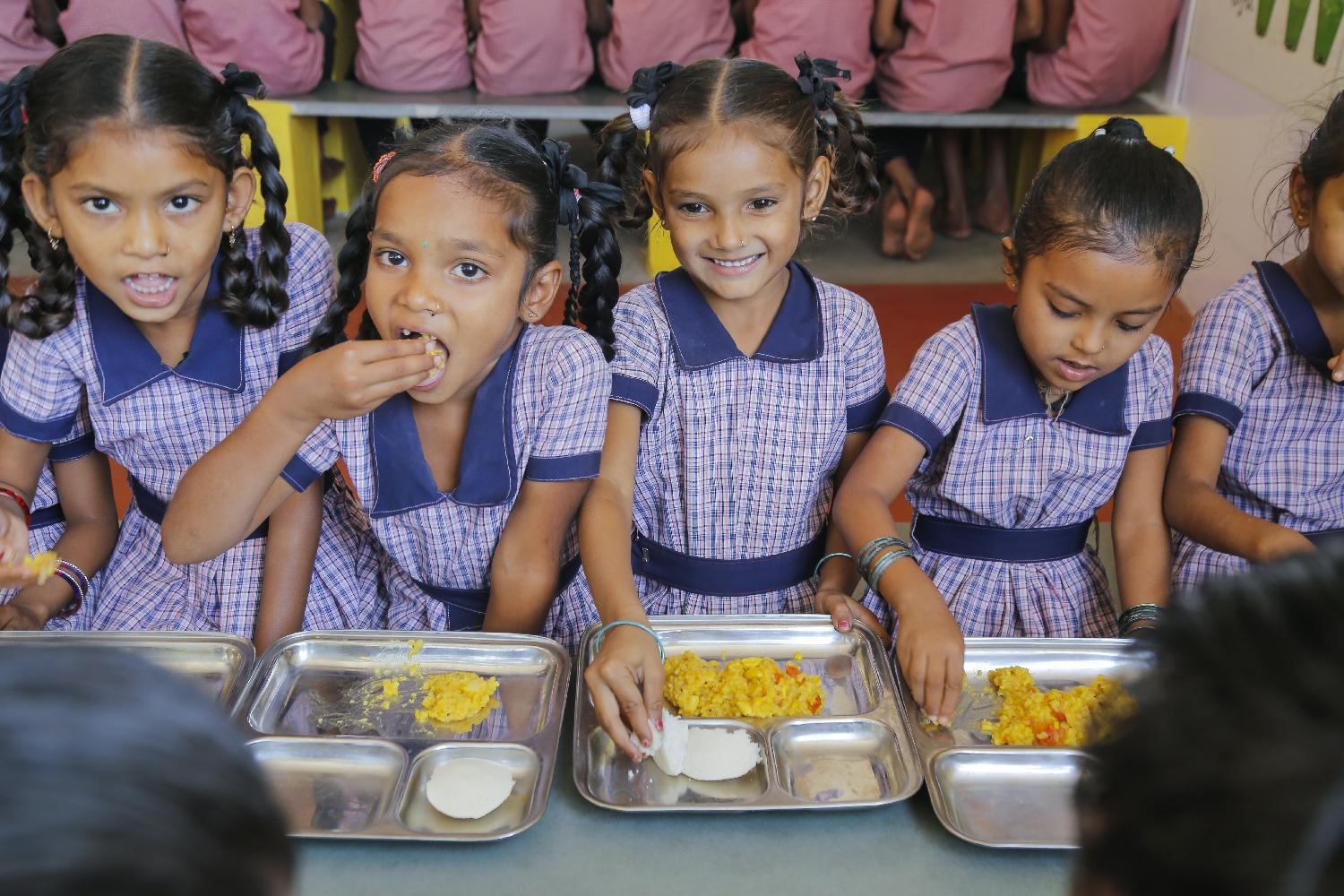 Feeding 1.8 million children a day across India.