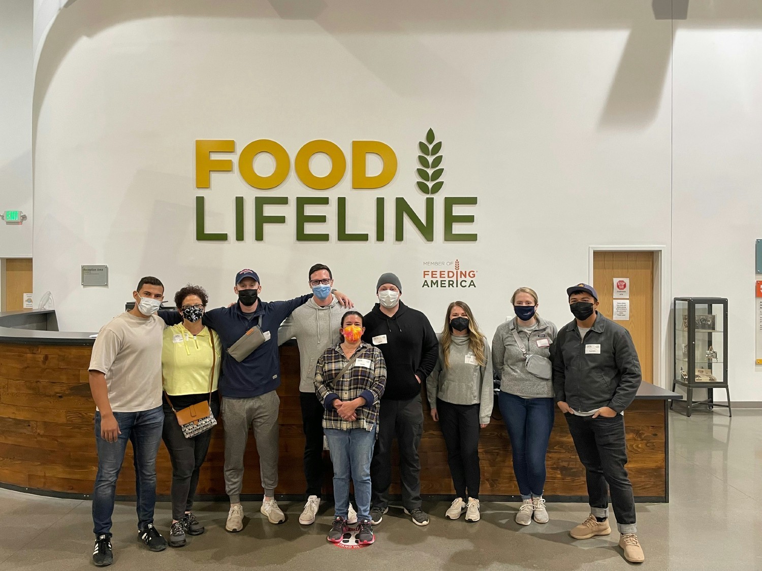 Some of our team volunteering at Food Lifeline, helping sort and package food donations for our community.