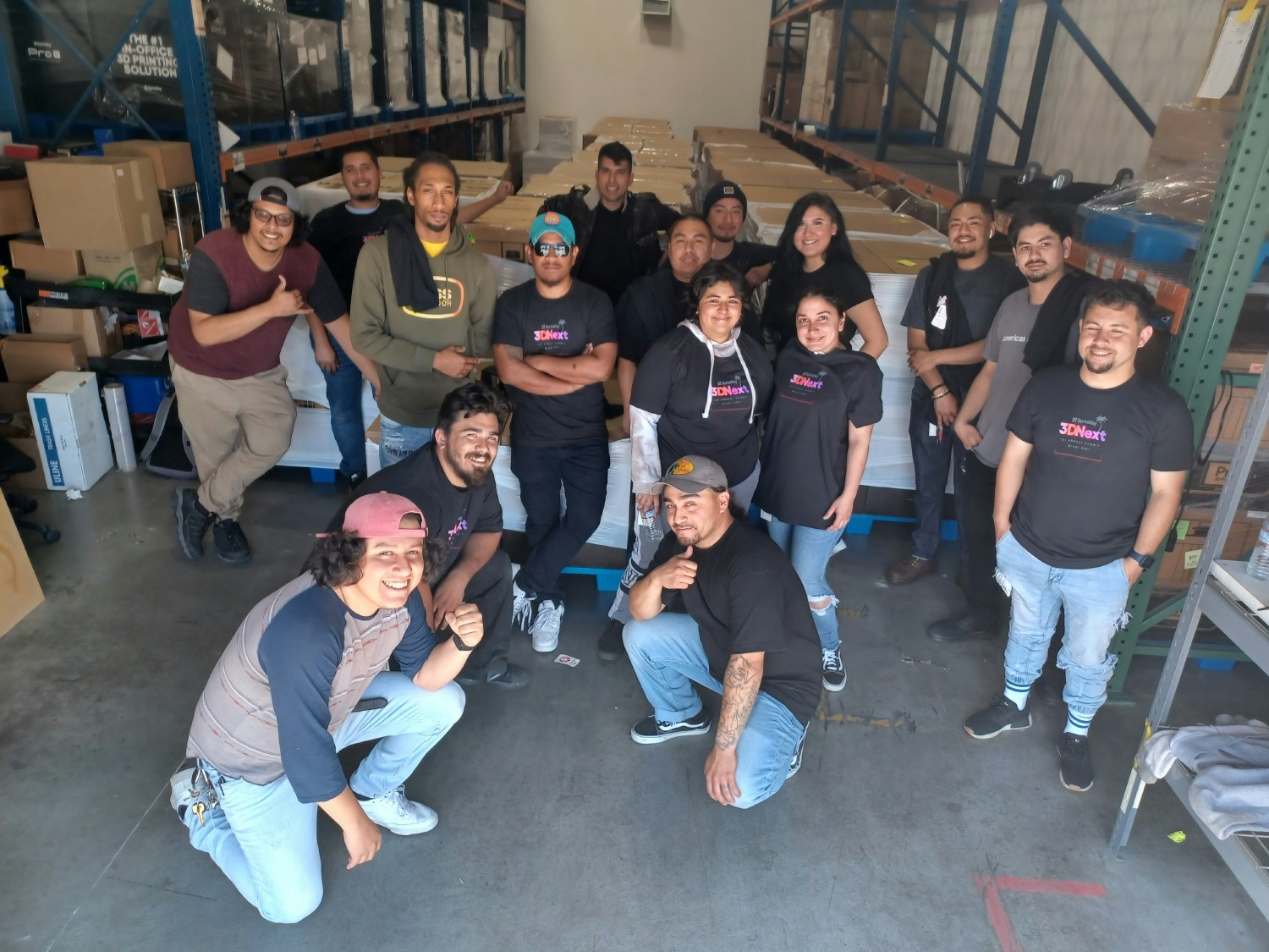 Members of the Quality Team gather after prepping a large shipment to customers