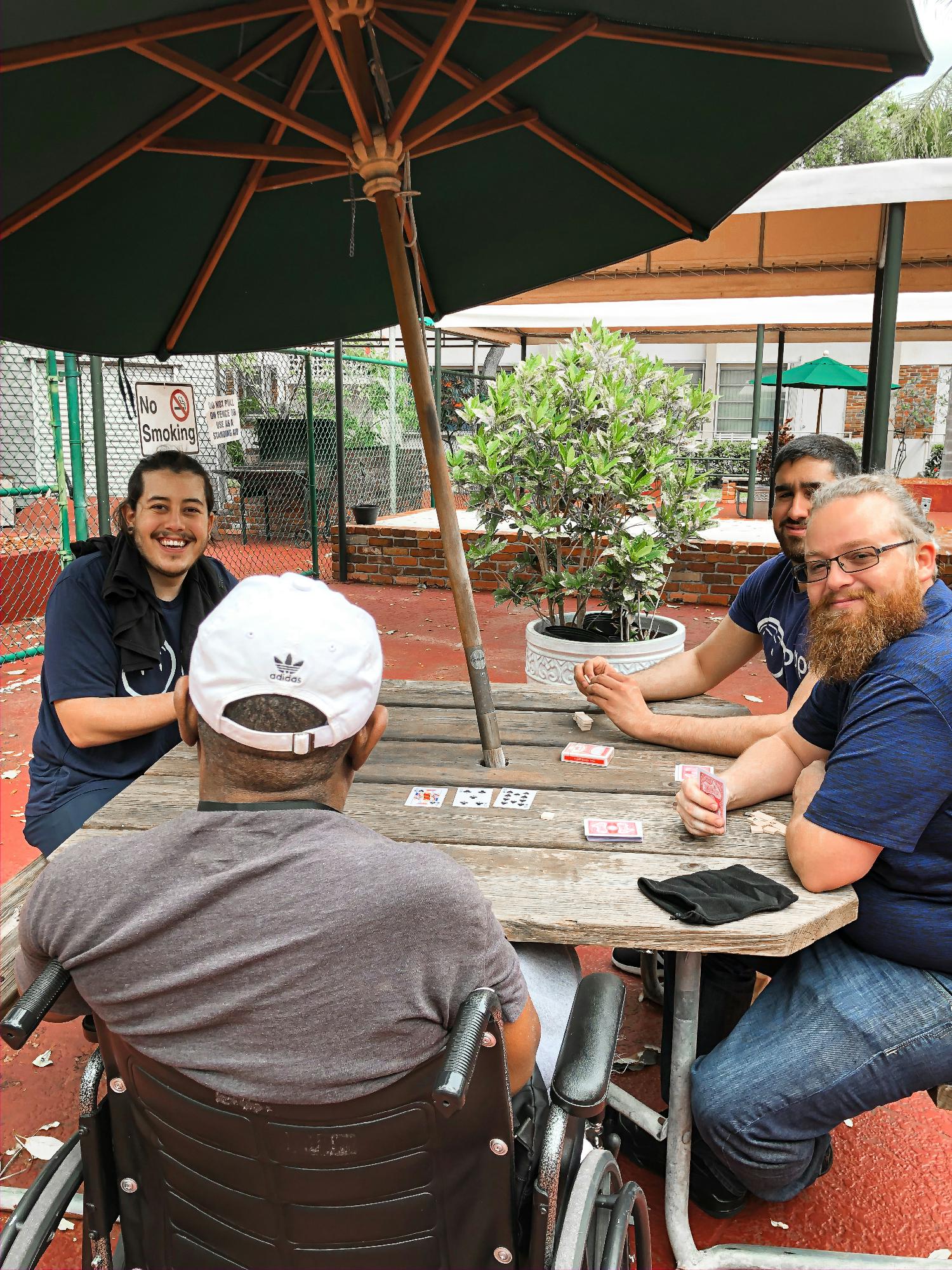 Employees at local geriatric home for a company volunteer initiative.