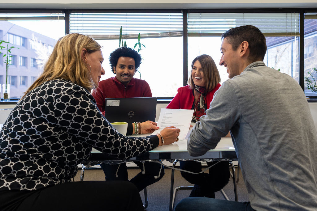 CQ fluency CEO and staff working closely together.