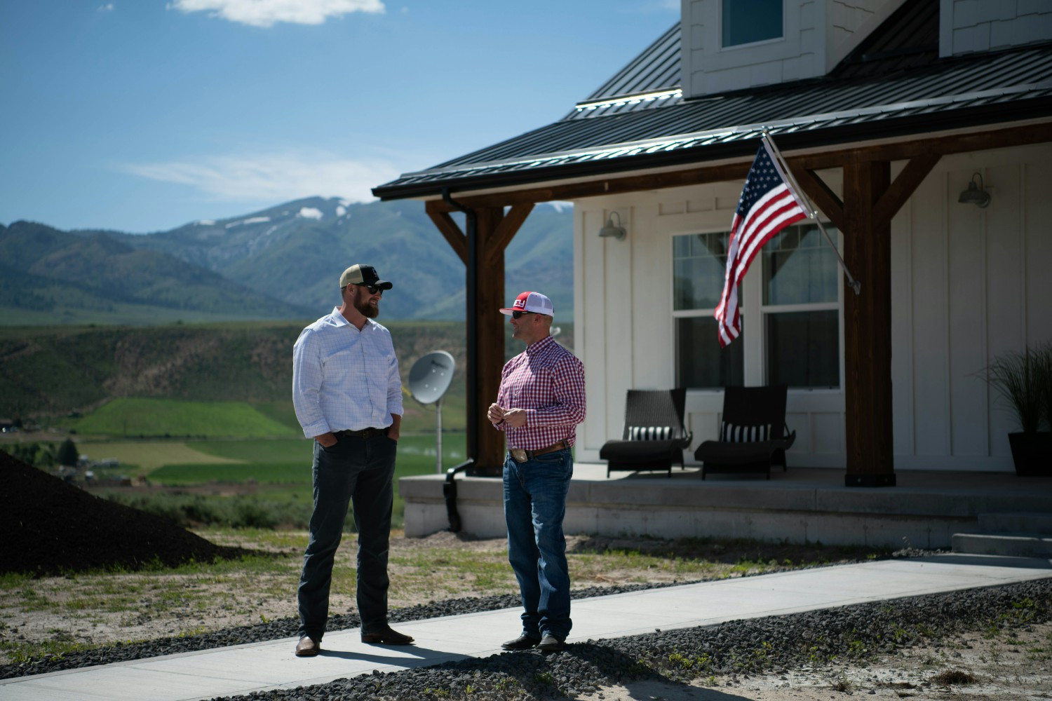 An AgAmerican visiting a farmer.