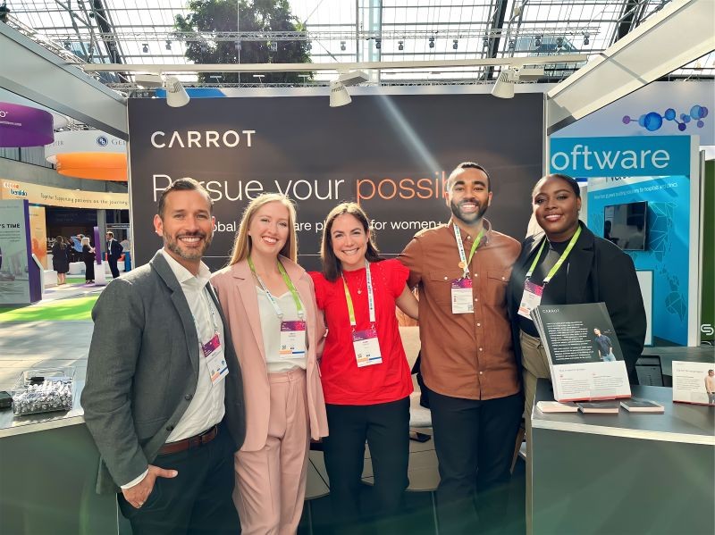 Carrot employees supporting a booth in Copenhagen.