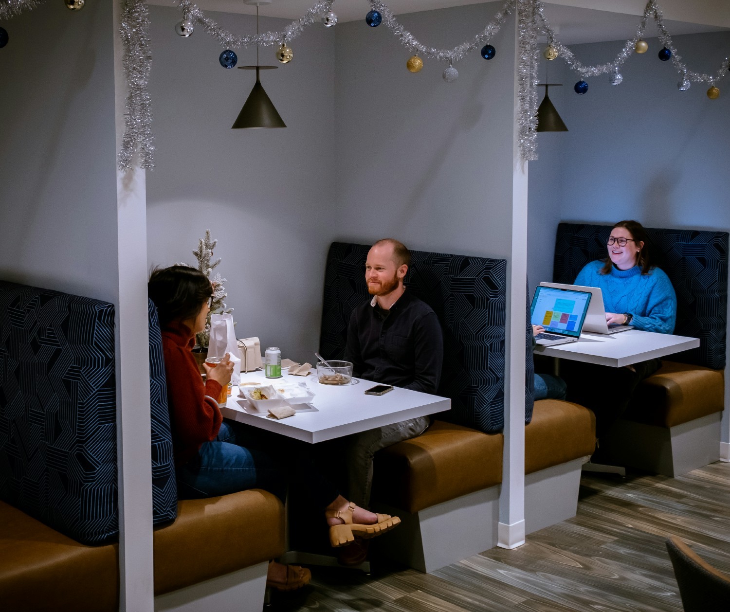 We're excited about our new office space - Including the eat-in kitchen booths for collaborating & chatting over lunch.