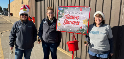 Team members used their Volunteer Time Off benefit to ring bells for Salvation Army.
