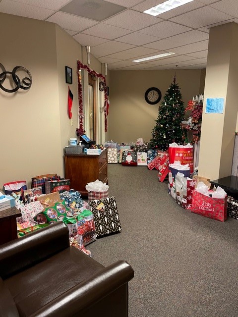 We LOVE to 'Adopt a Resident' every Christmas at EmpRes. Our main office is always overflowing with gift bags and boxes.