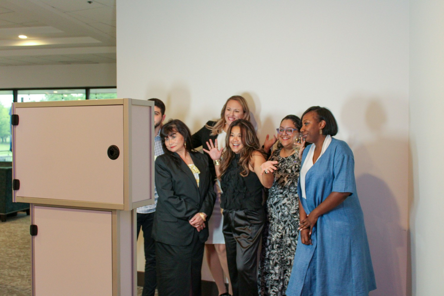 Staff posing for a photobooth photo at the 2025 annual Sales Awards Dinner.