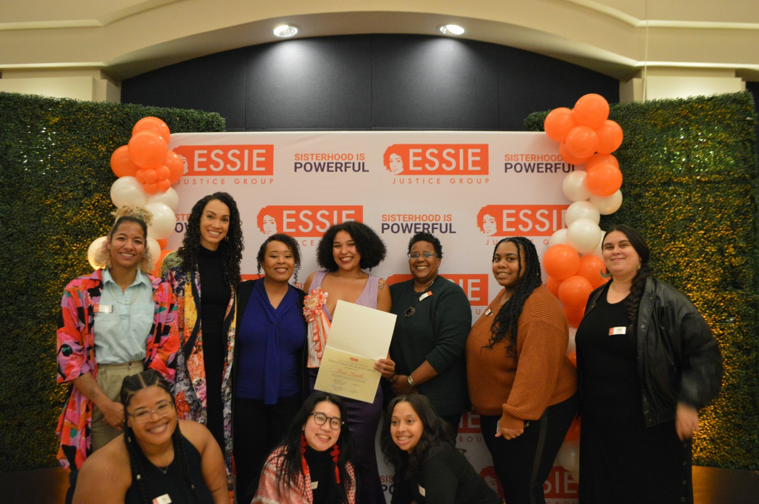 Essie staff at a Healing to Advocacy graduation.