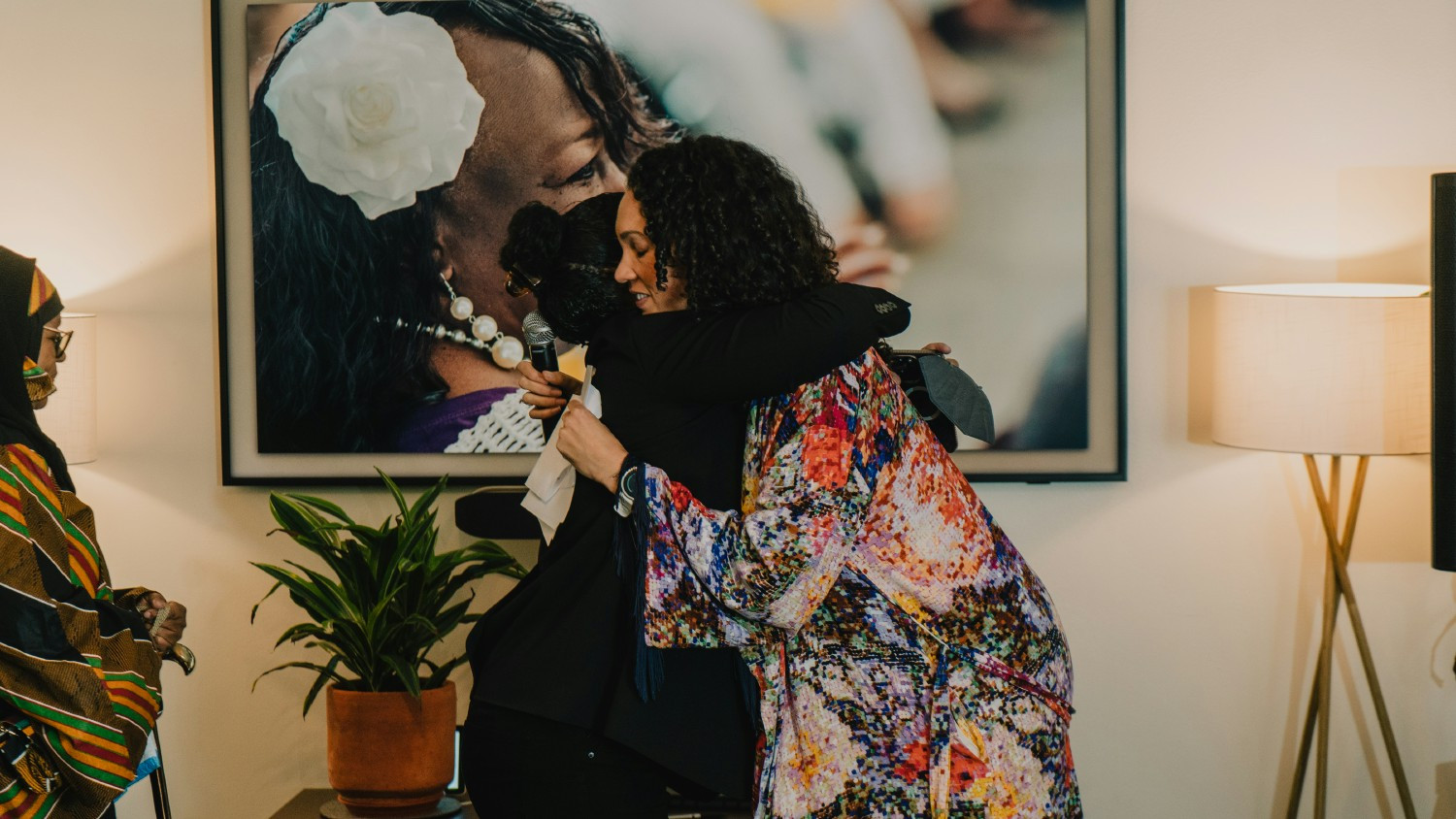 Founder & Executive Director Gina Clayton-Johnson and Wynter Daggs at an office opening.