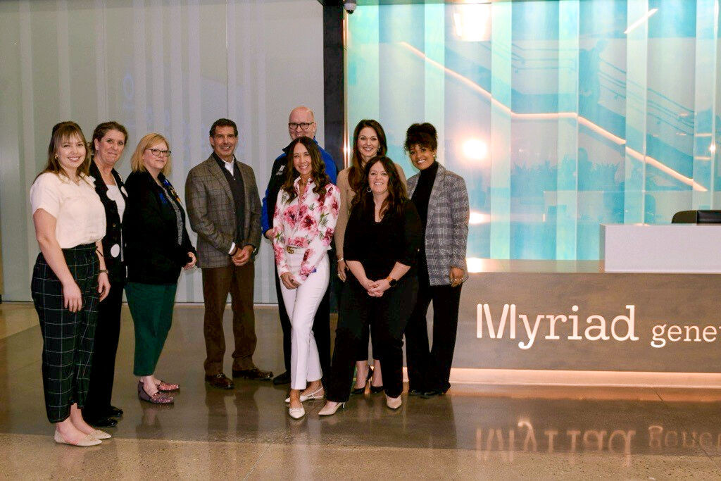 Paul Diaz with customers and employees at the grand opening of the new Salt Lake City campus.