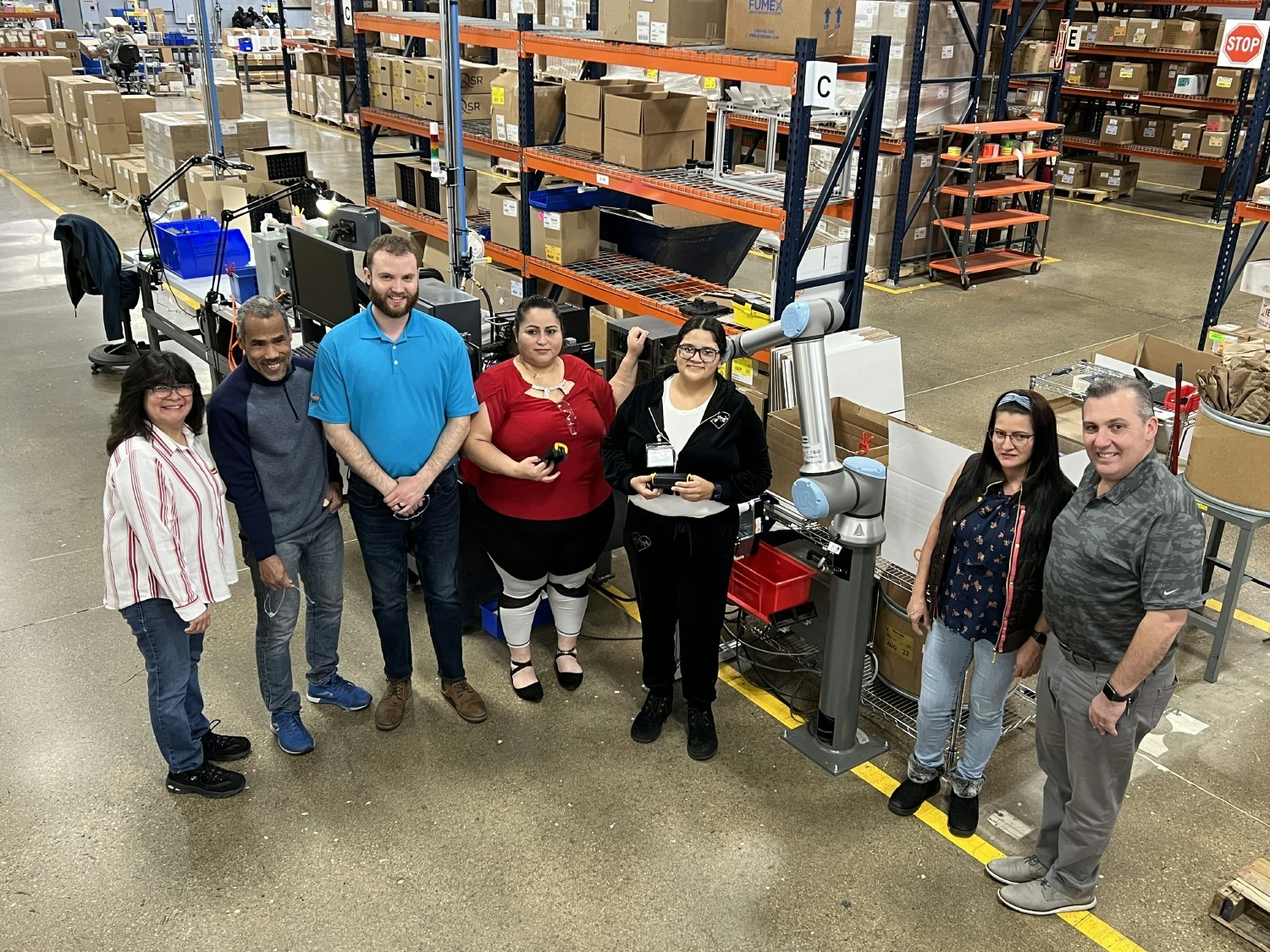 Chief Production & Engineering team hitting 100K pieces on the new collaborative robot assembly line. 