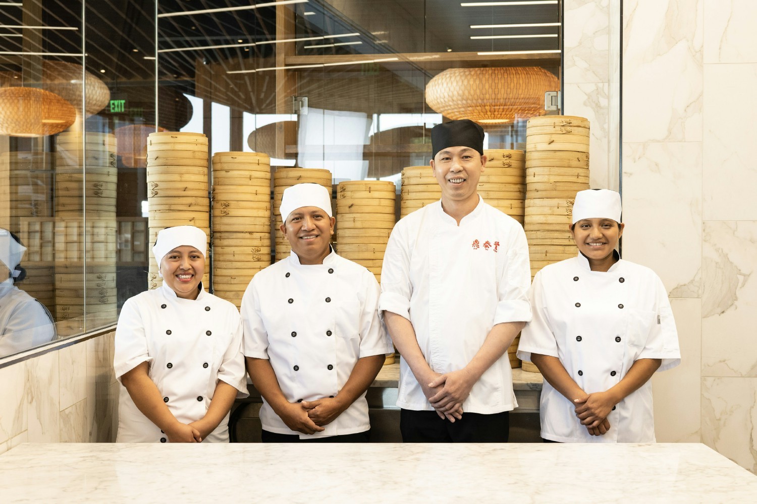 Every Din Tai Fung has a showcase kitchen, where dumpling chefs masterfully handcraft each Xiao Long Bao to perfection