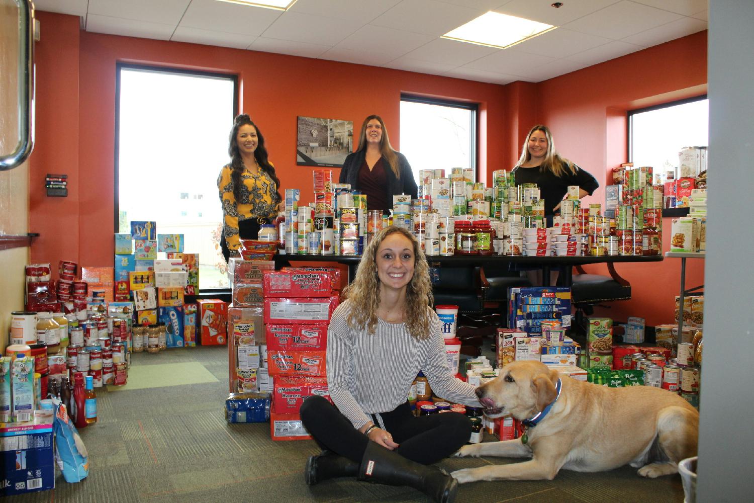 Employees organized a food drive on all construction sites collecting 2,000 pounds of food as well as cash donations