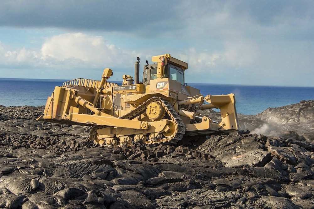 A D10 dozer navigates lava rocks in Hawaii