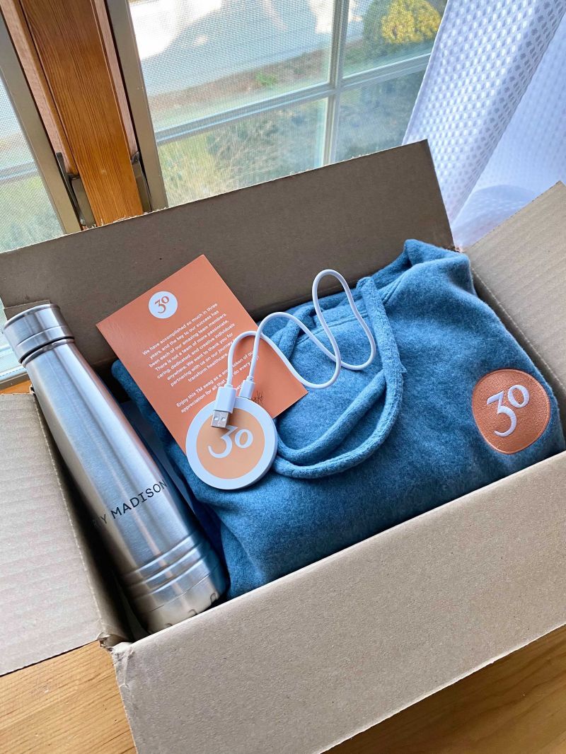 We might be remote, but we're still a team! We sent everyone at Thirty Madison a care package filled with swag.