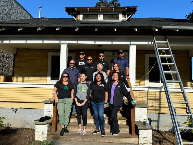 Presenting a finished home to a family affected by the wildfires.